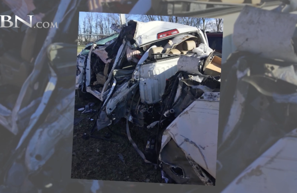 A Couple Got Stuck Inside A Destroyed Truck, Then They Saw Something Through The Window….